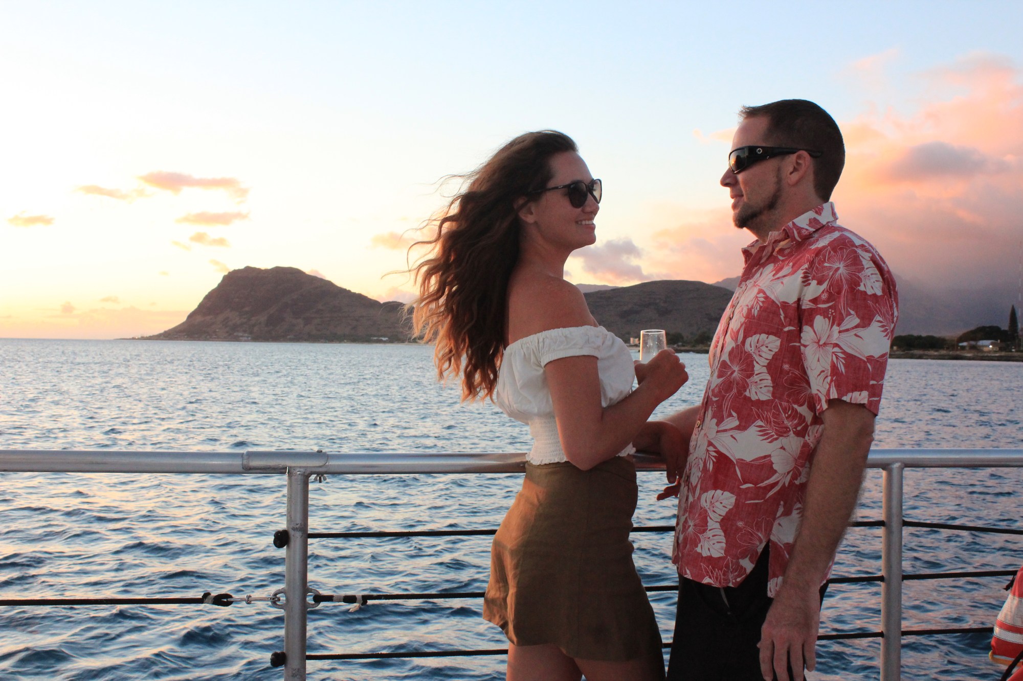 Kona Private Boat Charters in hawaii a person standing next to a body of water